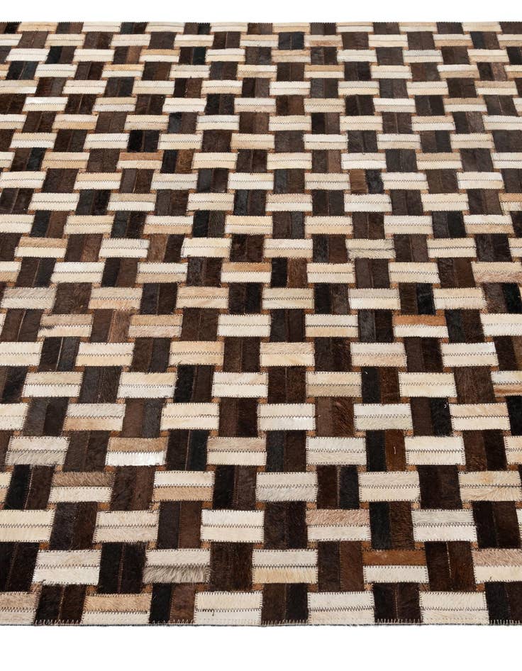 Detail image of  4' 11 x 7' 10 Cowhide - Patchwork Rug
