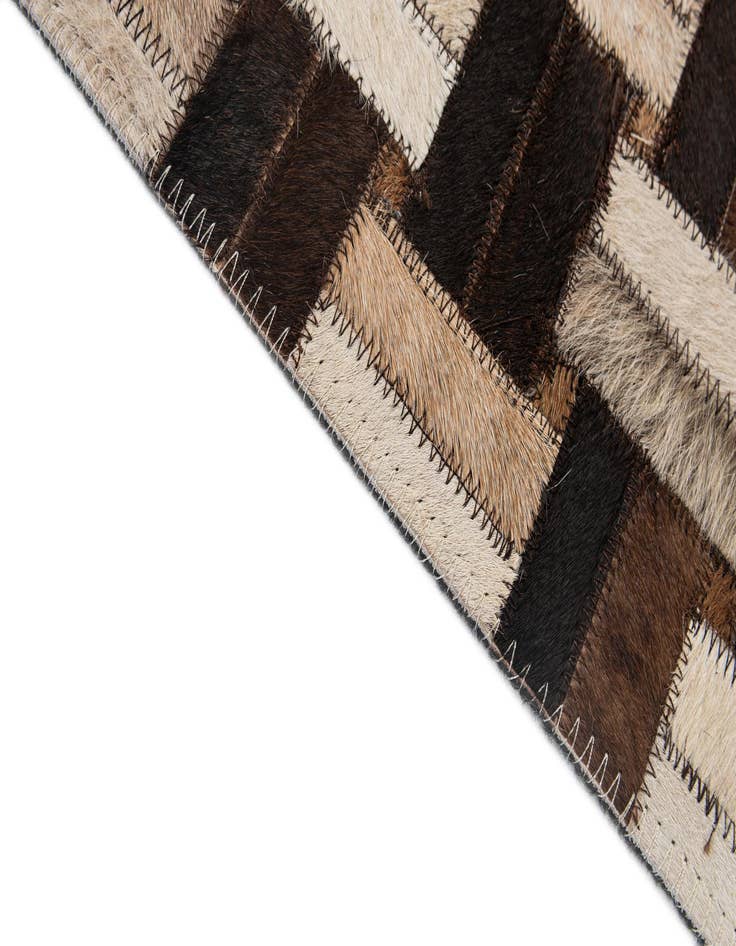 Detail image of  4' 11 x 7' 10 Cowhide - Patchwork Rug