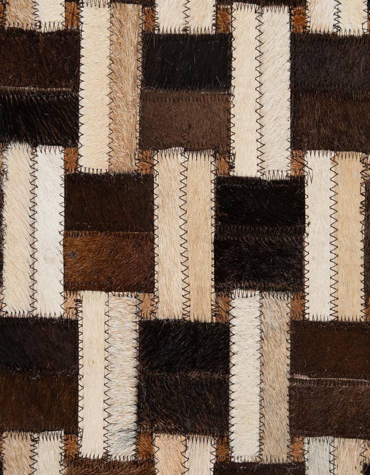 Detail image of  4' 11 x 7' 10 Cowhide - Patchwork Rug