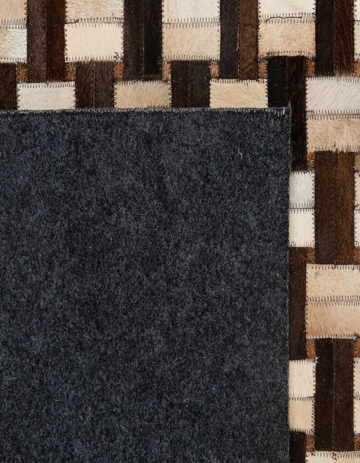 Detail image of  4' 11 x 7' 10 Cowhide - Patchwork Rug