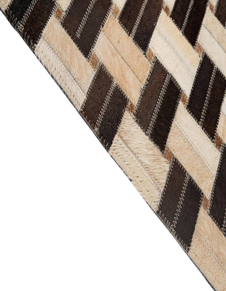 Detail image of  5' x 7' 11 Cowhide - Patchwork Rug