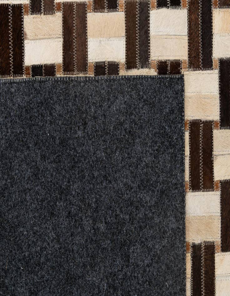 Detail image of  5' x 7' 11 Cowhide - Patchwork Rug