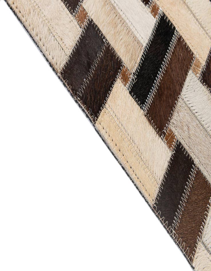 Detail image of  4' 11 x 7' 10 Cowhide - Patchwork Rug