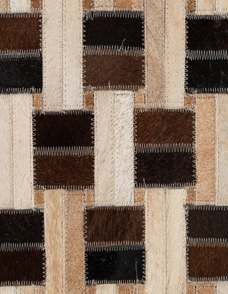 Detail image of  4' 11 x 7' 10 Cowhide - Patchwork Rug