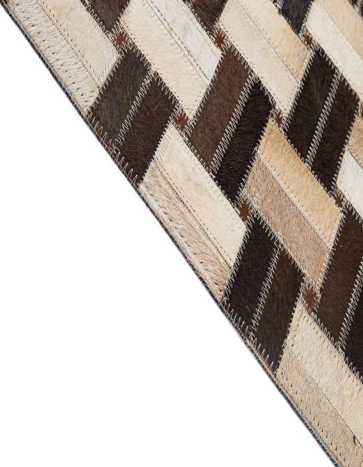Detail image of  5' x 7' 11 Cowhide - Patchwork Rug