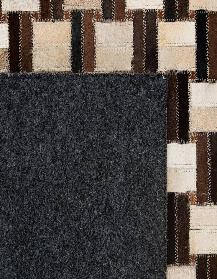 Detail image of  5' x 7' 11 Cowhide - Patchwork Rug