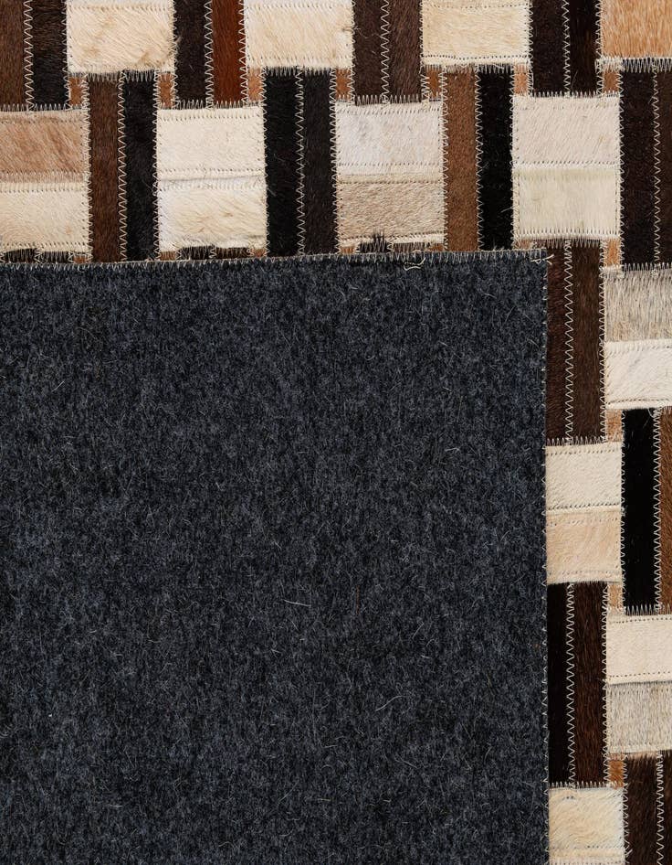 Detail image of  5' x 7' 9 Cowhide - Patchwork Rug