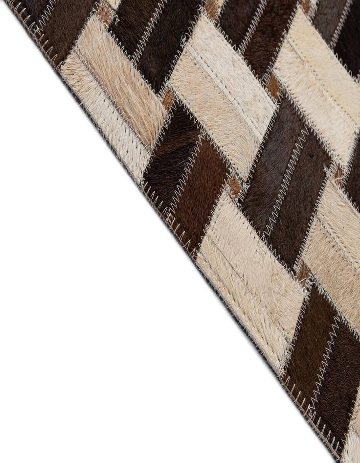 Detail image of  4' 11 x 7' 9 Cowhide - Patchwork Rug