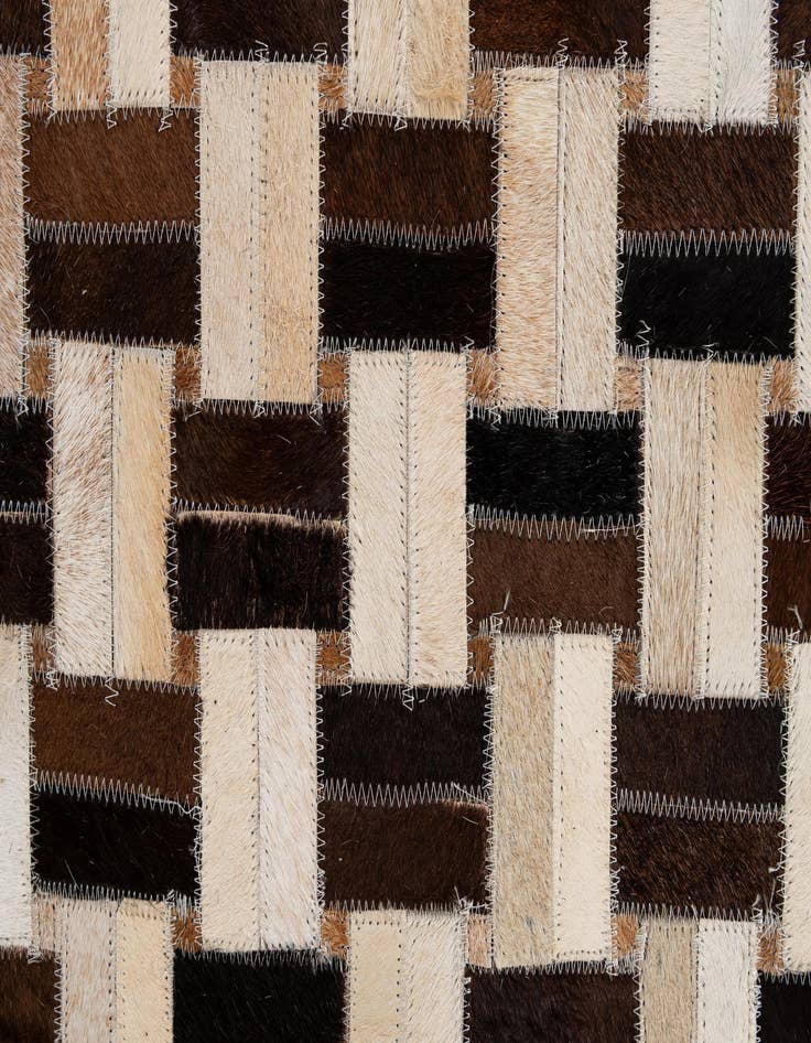 Detail image of  4' 11 x 7' 9 Cowhide - Patchwork Rug