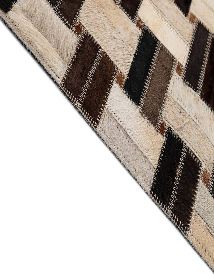 Detail image of  4' 11 x 7' 9 Cowhide - Patchwork Rug