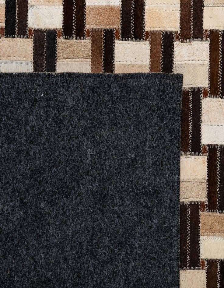 Detail image of  4' 11 x 7' 9 Cowhide - Patchwork Rug