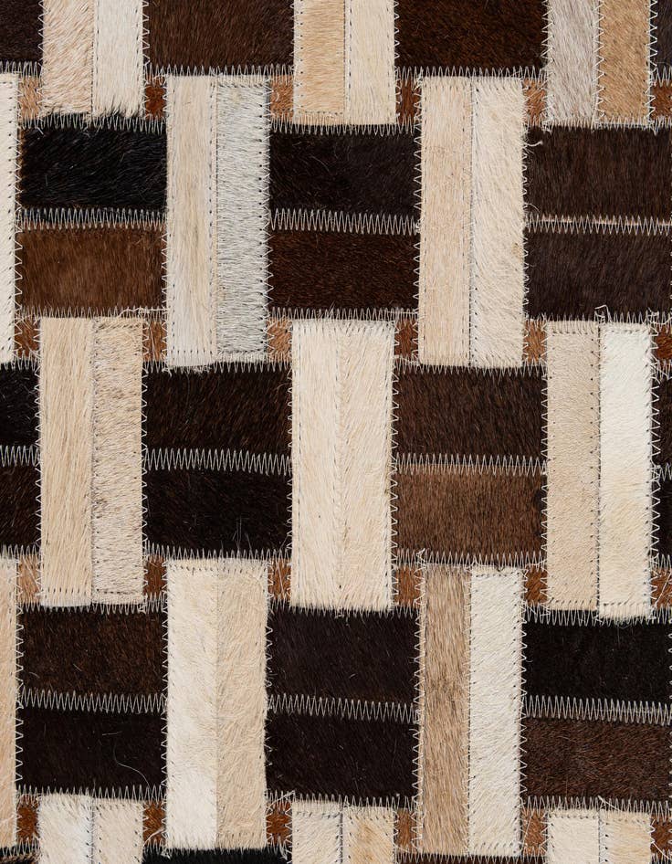 Detail image of  4' 11 x 7' 10 Cowhide - Patchwork Rug