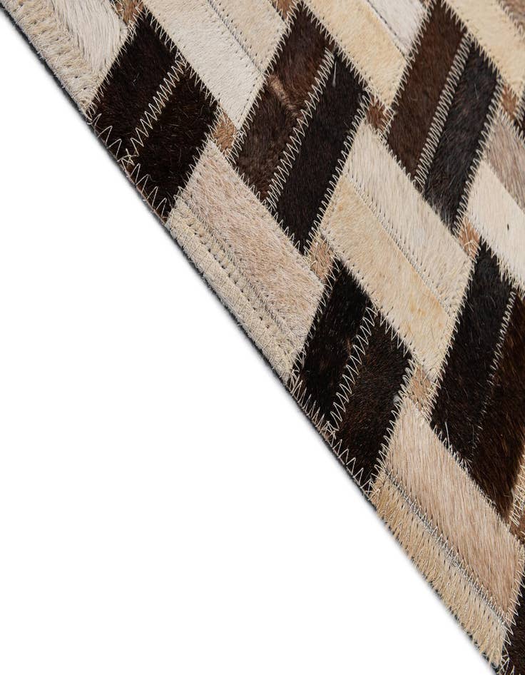 Detail image of  4' 11 x 7' 10 Cowhide - Patchwork Rug