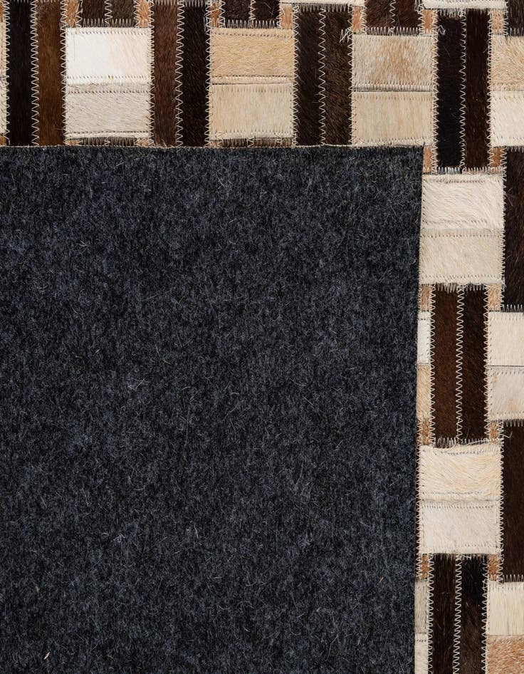 Detail image of  4' 11 x 7' 10 Cowhide - Patchwork Rug
