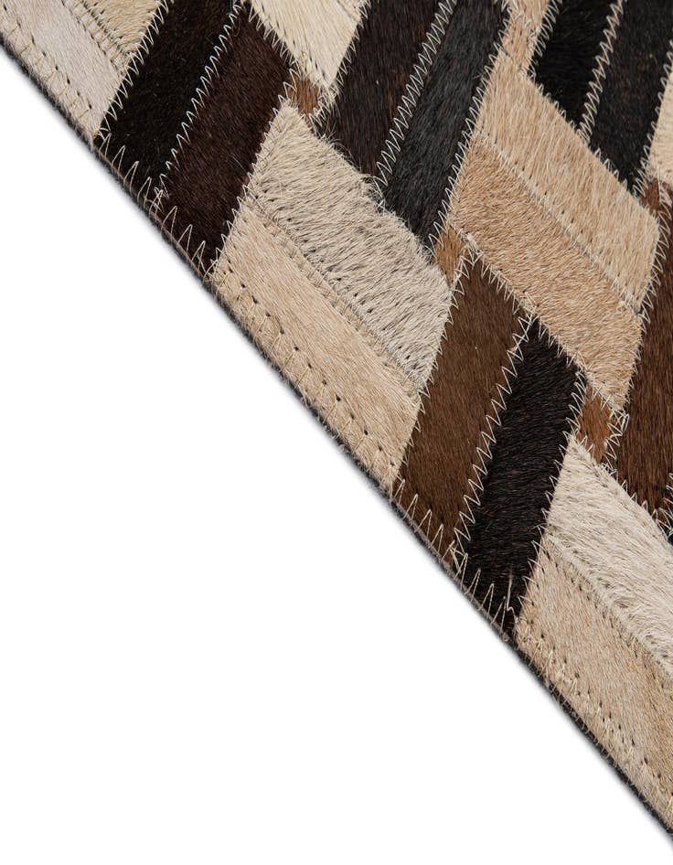 Detail image of  4' 11 x 7' 11 Cowhide - Patchwork Rug