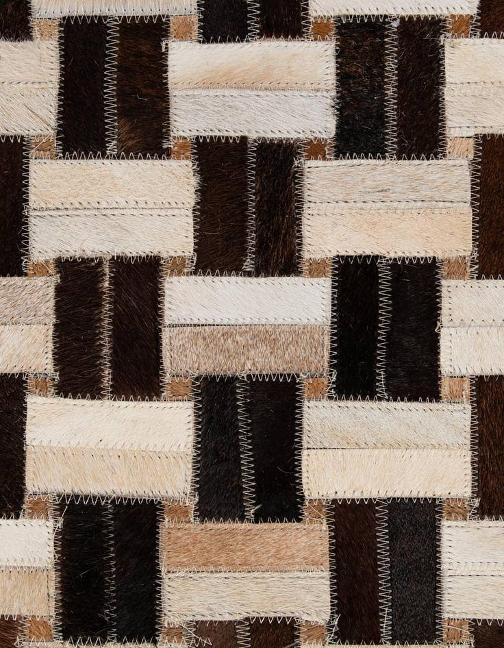 Detail image of  4' 11 x 7' 11 Cowhide - Patchwork Rug