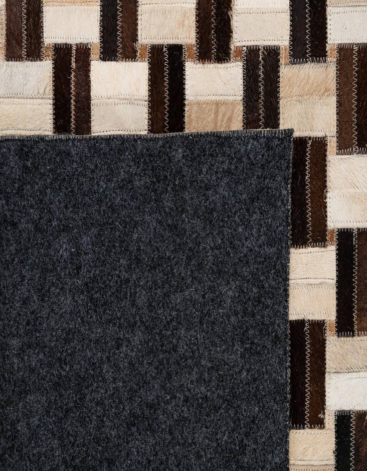 Detail image of  4' 11 x 7' 11 Cowhide - Patchwork Rug