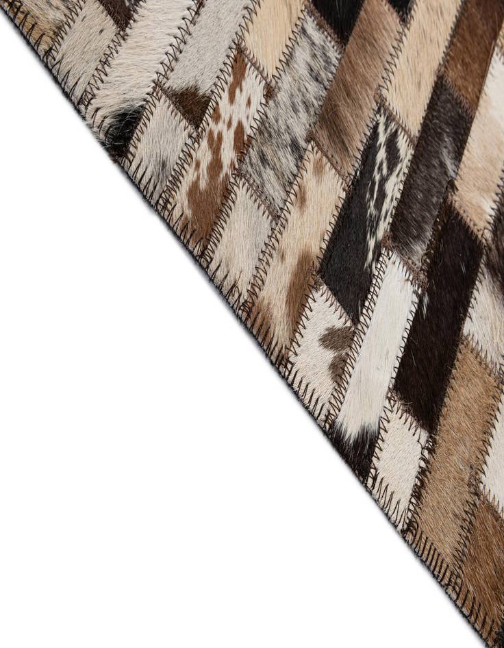 Detail image of  5' 2 x 7' 10 Cowhide - Patchwork Rug