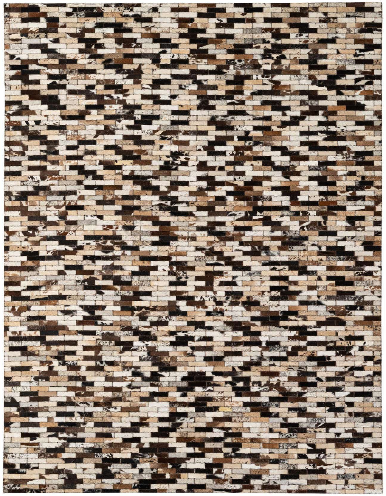 A 5x8 rectangular Cowhide Patchwork rug featuring a modern stripe pattern in multi-colored natural cowhide and leather.