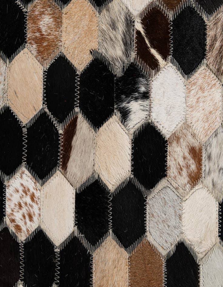 Detail image of  5' 1 x 7' 11 Cowhide - Patchwork Rug