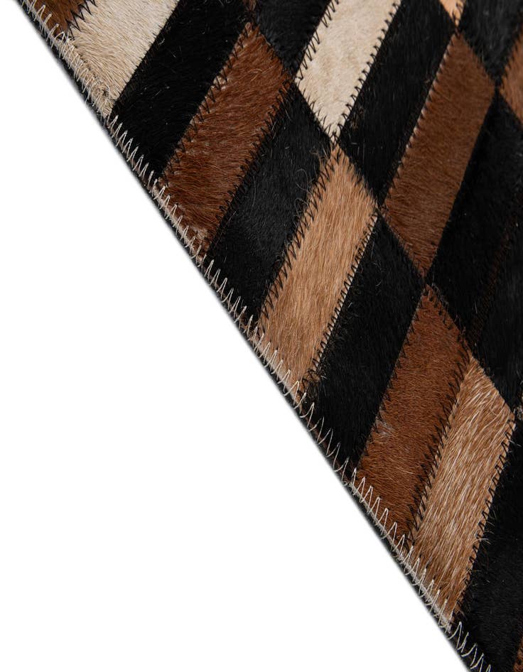 Detail image of  5' 3 x 8' Cowhide - Patchwork Rug