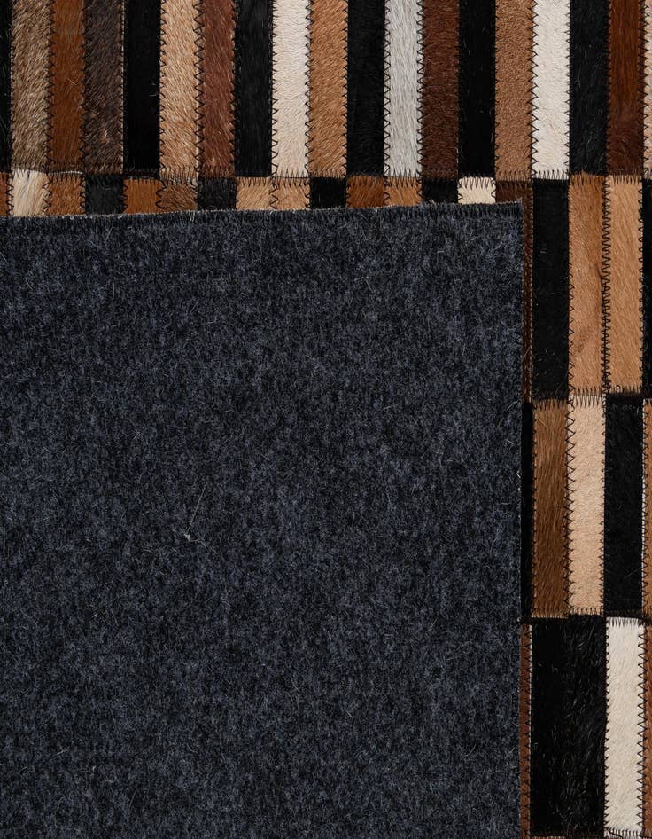 Detail image of  5' 3 x 8' Cowhide - Patchwork Rug