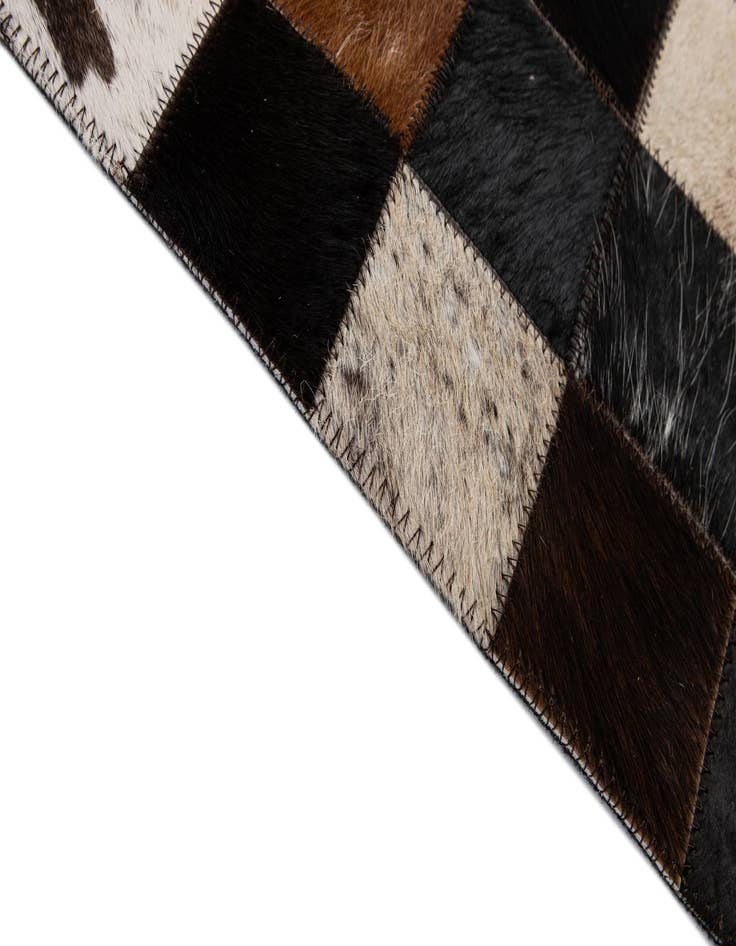 Detail image of  5' 2 x 7' 11 Cowhide - Patchwork Rug