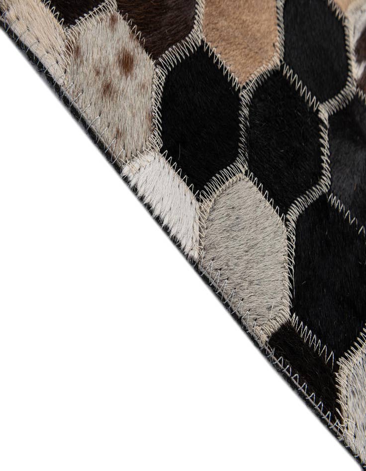 Detail image of  5' 1 x 7' 10 Cowhide - Patchwork Rug