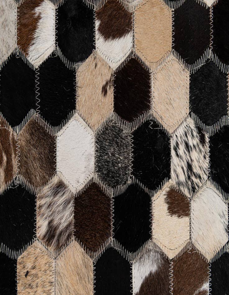 Detail image of  5' 1 x 7' 10 Cowhide - Patchwork Rug