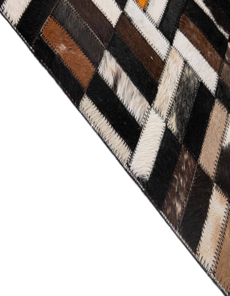 Detail image of  5' 2 x 8' Cowhide - Patchwork Rug