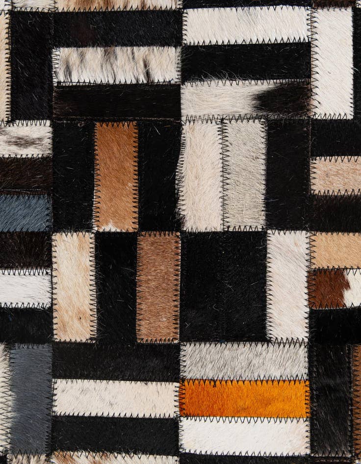 Detail image of  5' 2 x 8' Cowhide - Patchwork Rug