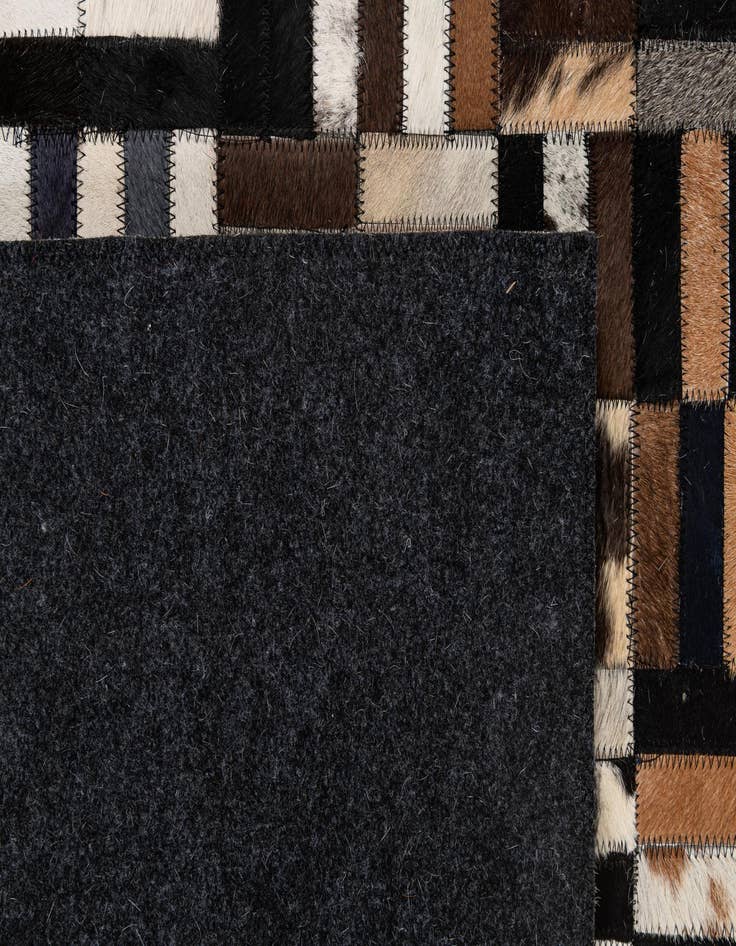 Detail image of  5' 2 x 8' Cowhide - Patchwork Rug