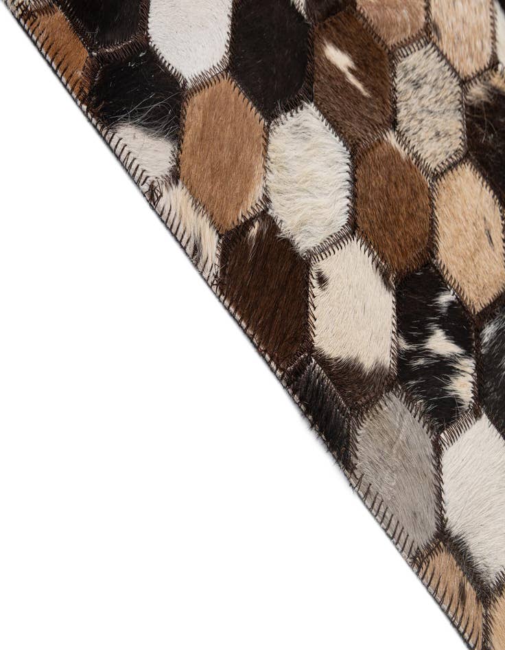 Detail image of  5' 1 x 7' 11 Cowhide - Patchwork Rug