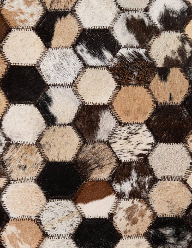 Detail image of  5' 1 x 7' 11 Cowhide - Patchwork Rug