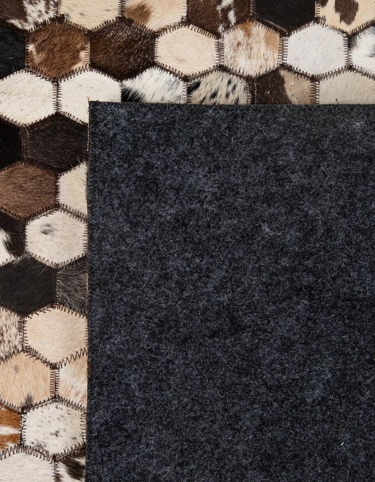 Detail image of  5' 1 x 7' 11 Cowhide - Patchwork Rug
