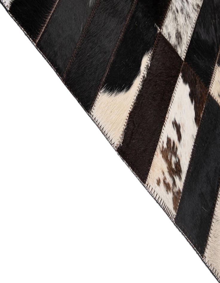 Detail image of  4' 11 x 7' 11 Cowhide - Patchwork Rug