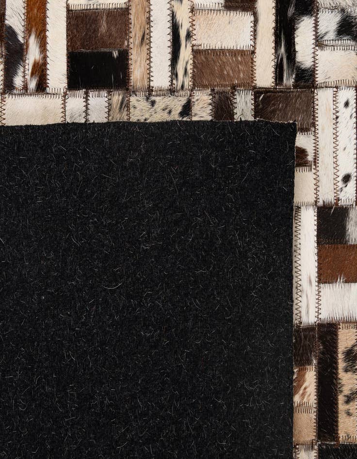 Detail image of  5' 1 x 8' Cowhide - Patchwork Rug