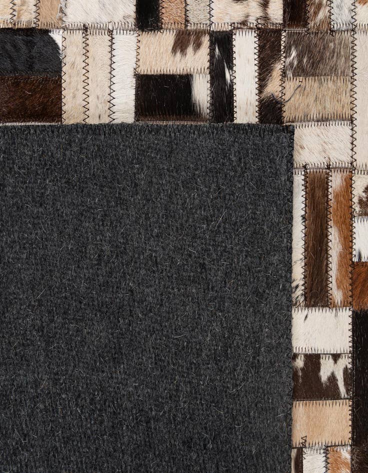 Detail image of  4' 11 x 7' 11 Cowhide - Patchwork Rug