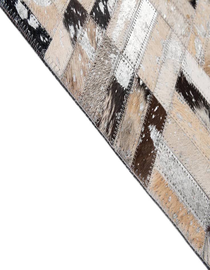 Detail image of  5' x 7' 11 Cowhide - Patchwork Rug