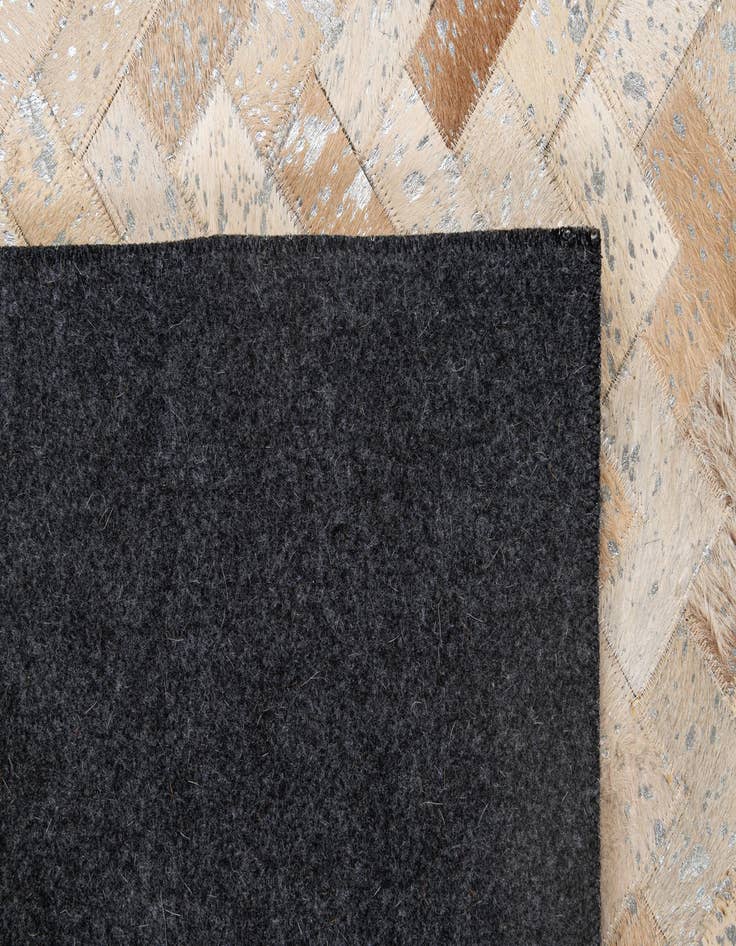Detail image of  5' x 7' 11 Cowhide - Patchwork Rug