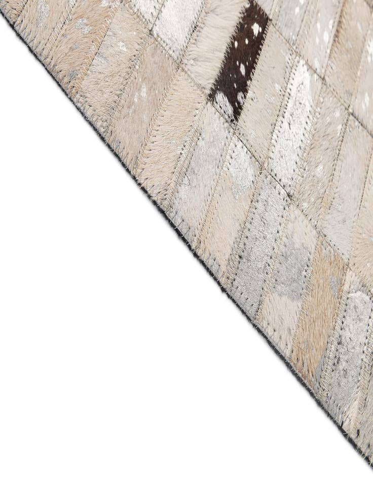Detail image of  4' 11 x 8' 1 Cowhide - Patchwork Rug