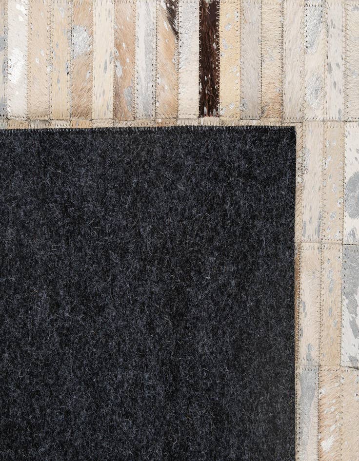 Detail image of  4' 11 x 8' 1 Cowhide - Patchwork Rug