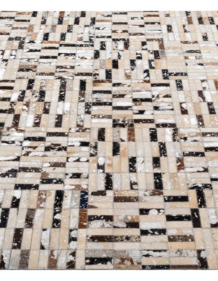 Detail image of  5' 1 x 7' 11 Cowhide - Patchwork Rug