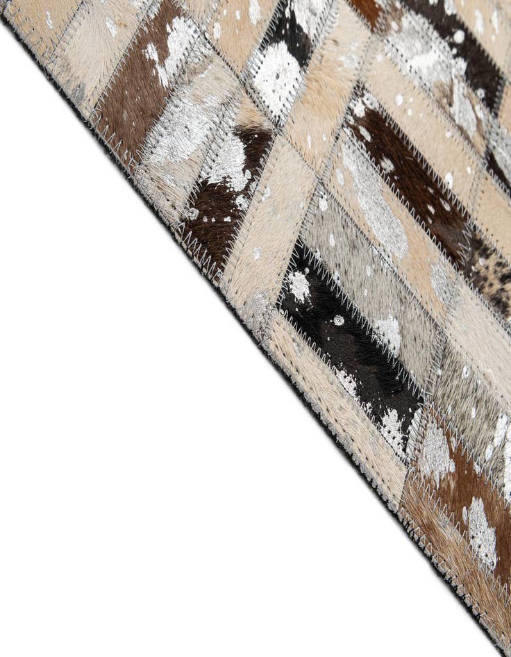 Detail image of  5' 1 x 7' 11 Cowhide - Patchwork Rug