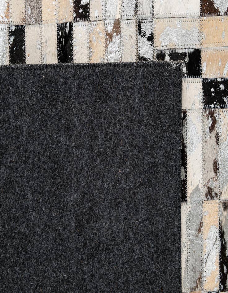 Detail image of  5' 1 x 7' 11 Cowhide - Patchwork Rug