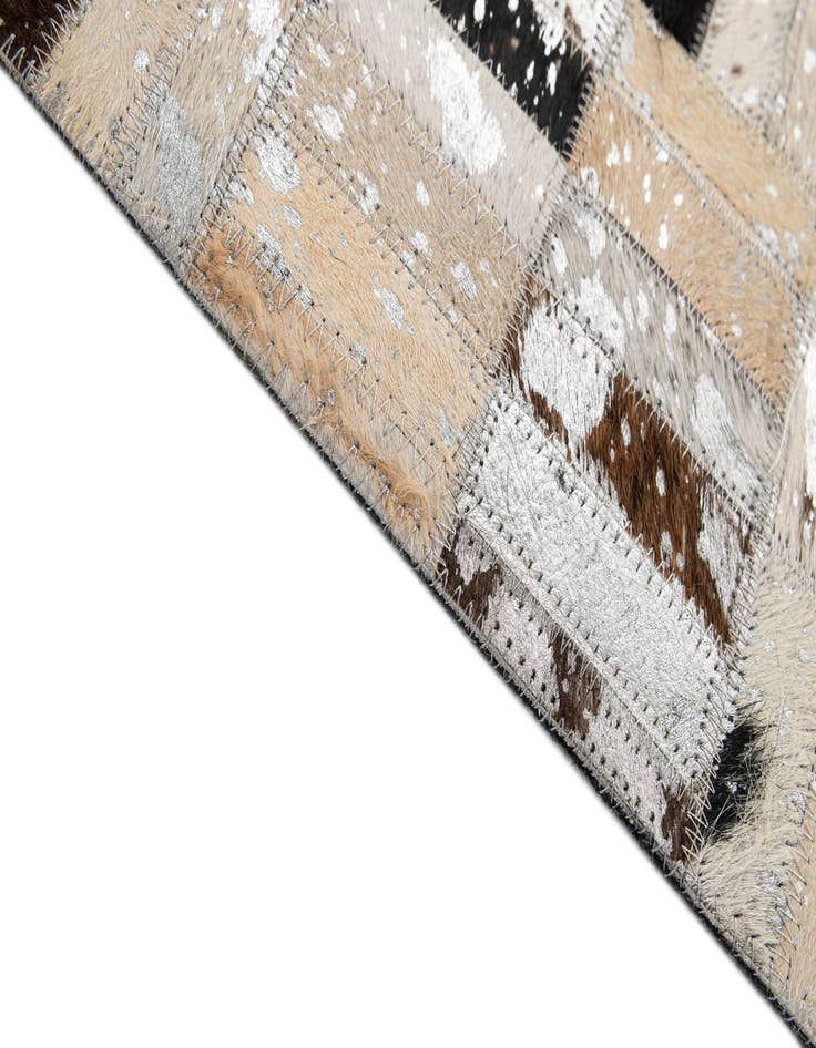Detail image of  5' x 7' 11 Cowhide - Patchwork Rug