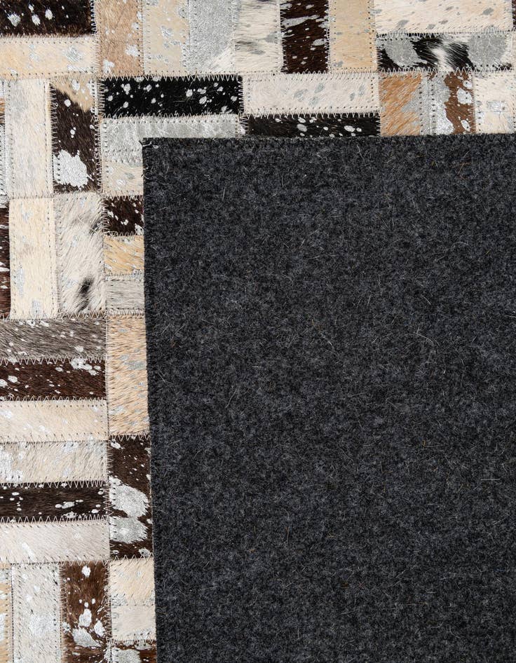 Detail image of  5' x 7' 11 Cowhide - Patchwork Rug