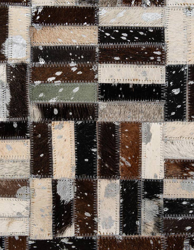 Detail image of  4' 11 x 7' 10 Cowhide - Patchwork Rug