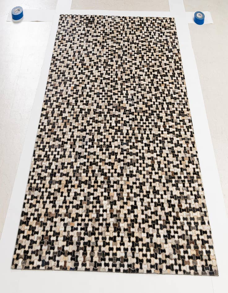 Detail image of  5' 1 x 7' 11 Cowhide - Patchwork Rug