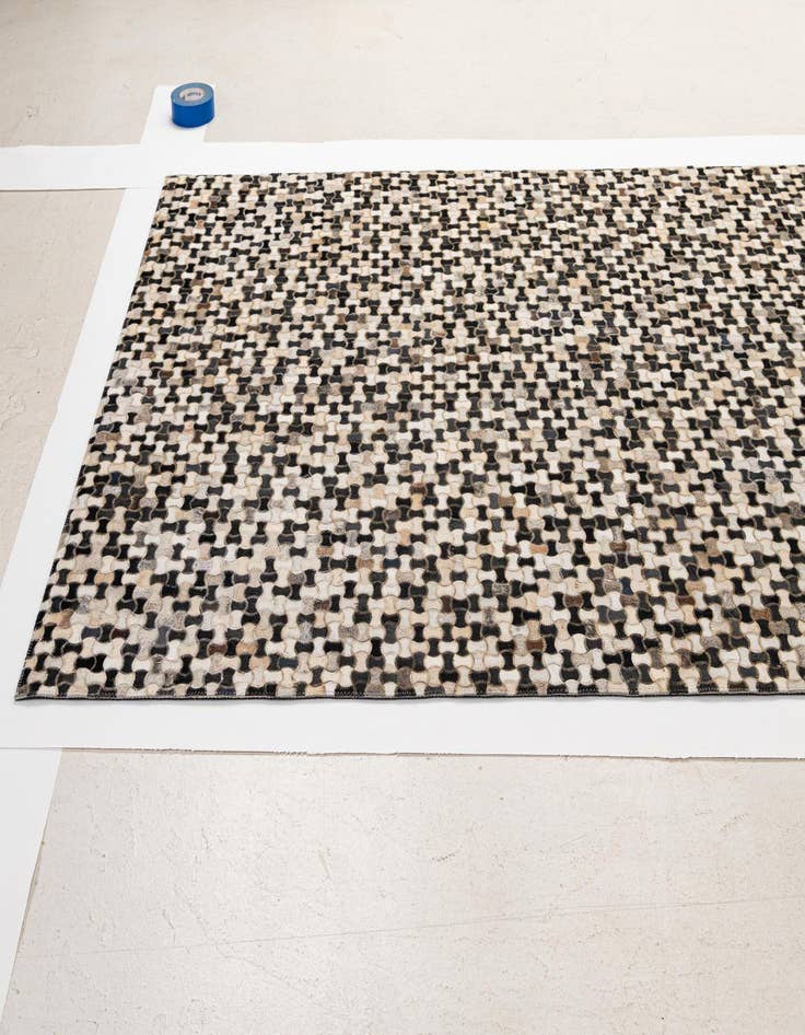 Detail image of  5' 1 x 7' 11 Cowhide - Patchwork Rug